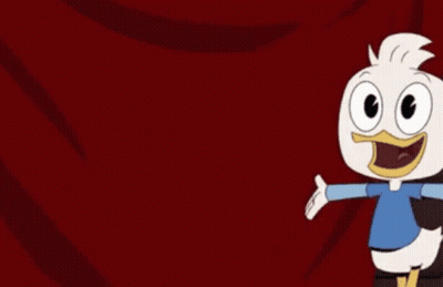 A Cartoon Duck In A Blue Shirt Is Standing In Front Of A Red Curtain . GIF