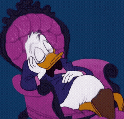 A Cartoon Duck Is Sitting In A Purple Chair GIF