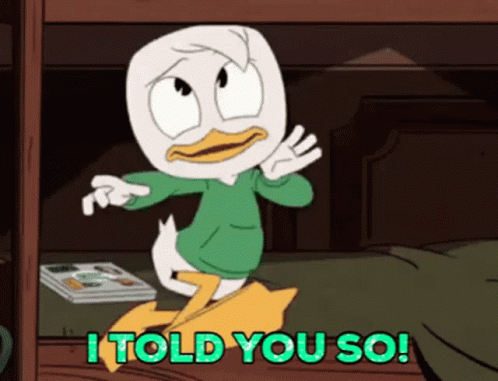 A Cartoon Duck Says I Told You So In Green Letters GIF