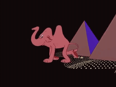 A Cartoon Elephant Is Walking In Front Of A Pyramid In The Dark . GIF