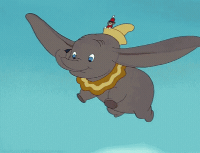 A Cartoon Elephant With A Red Hat On Its Head Is Flying In The Air GIF