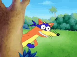 A Cartoon Fox Is Peeking Out From Behind A Tree In A Field . GIF