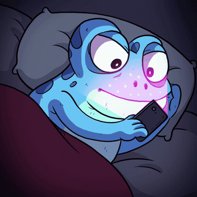 A Cartoon Frog Is Laying In Bed Looking At His Phone GIF