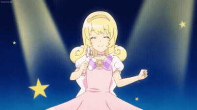 A Cartoon Girl In A Pink Dress Is Dancing On A Stage GIF