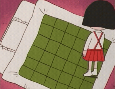 A Cartoon Girl In A Red Skirt Is Standing On A Green Checkered Blanket . GIF