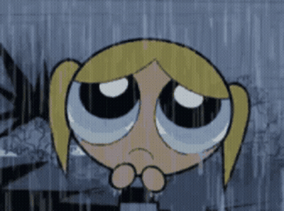 A Cartoon Girl Is Crying In The Rain GIF