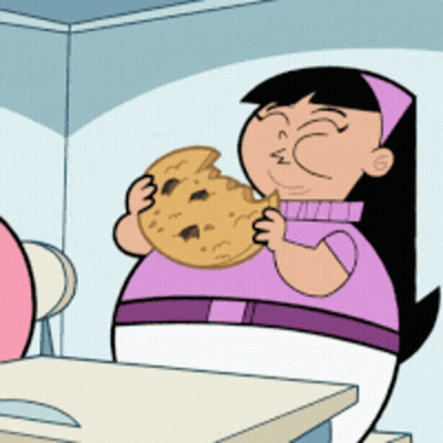 A Cartoon Girl Is Eating A Cookie With A Slice Missing GIF
