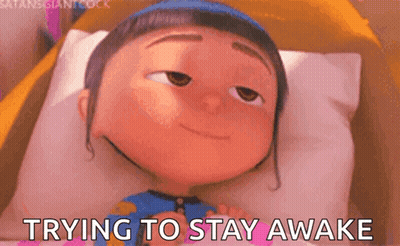 A Cartoon Girl Is Laying On A Bed With The Words Trying To Stay Awake Written Below Her GIF