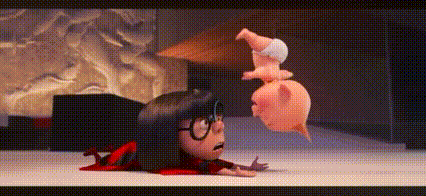 A Cartoon Girl Is Laying On The Floor Next To A Baby Doll . GIF