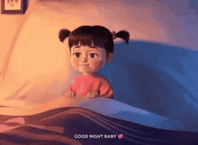 A Cartoon Girl Is Sitting In A Bed With The Words " Good Night Baby " Above Her GIF