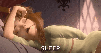 A Cartoon Girl Is Sleeping On A Bed With Her Eyes Closed And The Words `` Sleep '' Written Next To Her . GIF