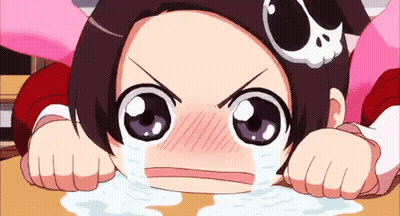 A Cartoon Girl With A Skull On Her Head Is Crying And Making A Funny Face . GIF