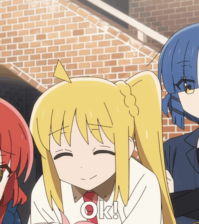 A Cartoon Girl With Blonde Hair Is Smiling With The Word Ok Below Her GIF