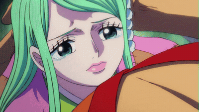 A Cartoon Girl With Green Hair And Blue Eyes GIF