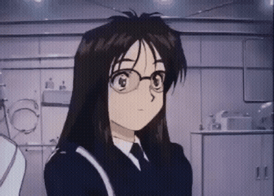 A Cartoon Girl With Long Hair And Glasses Is Standing In A Room . GIF