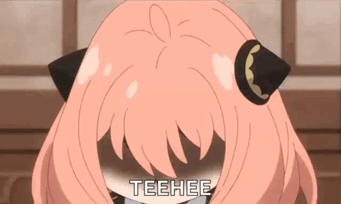 A Cartoon Girl With Pink Hair And Black Ears Is Making A Funny Face And Says Teehee . GIF