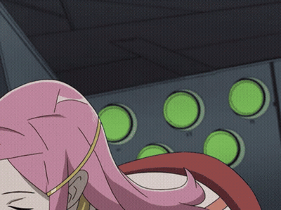 A Cartoon Girl With Pink Hair Is Laying Down GIF