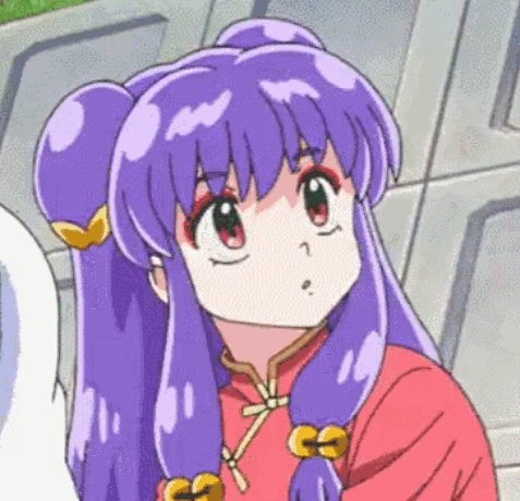 A Cartoon Girl With Purple Hair And A Red Shirt Is Looking At The Camera . GIF