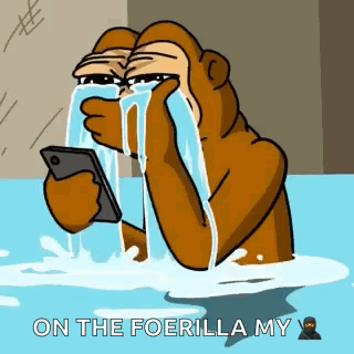 A Cartoon Gorilla Is Crying While Holding A Cell Phone In The Water . GIF