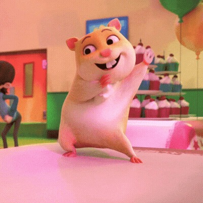 A Cartoon Hamster Is Standing On A Table In Front Of Cupcakes And Balloons GIF