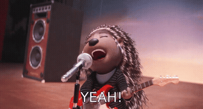 A Cartoon Hedgehog Singing Into A Microphone While Holding A Guitar And The Word Yeah Next To Him GIF
