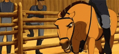 A Cartoon Horse Is Standing Next To A Wooden Fence And A Man Is Riding It . GIF