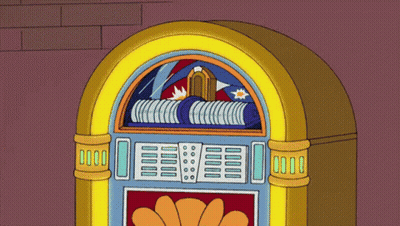 A Cartoon Jukebox Has A Flower On The Front Of It GIF