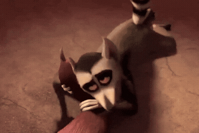 A Cartoon Lemur Is Hugging Another Lemur In A Dark Room . GIF