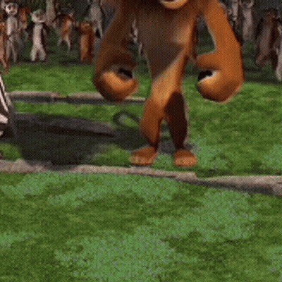 A Cartoon Lion Is Laying On The Grass With Its Mouth Open And A Crowd Of Monkeys Behind It . GIF