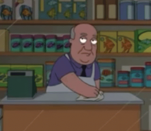 A Cartoon Man Is Standing Behind A Counter In A Store GIF