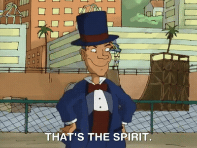 A Cartoon Man Wearing A Top Hat And A Tuxedo Says That 'S The Spirit GIF
