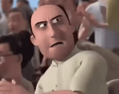 A Cartoon Man With A Bald Head Is Sitting In A Crowd Of People . GIF