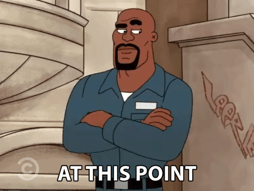 A Cartoon Man With His Arms Crossed And The Words At This Point Below Him GIF