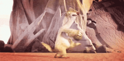 A Cartoon Meerkat Is Standing On Its Hind Legs In Front Of A Rock Formation . GIF