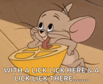 A Cartoon Mouse Is Licking A Lemon Slice . GIF