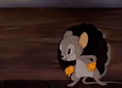A Cartoon Mouse Is Running Through A Hole In A Wall And Eating A Piece Of Cheese . GIF