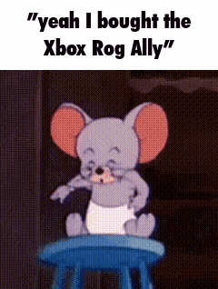 A Cartoon Mouse Is Sitting On A Blue Stool With The Caption " Yeah I Bought The Xbox Rog Ally " . GIF