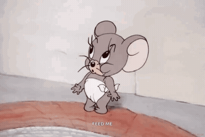 A Cartoon Mouse Is Wearing A Diaper And Saying Feed Me GIF