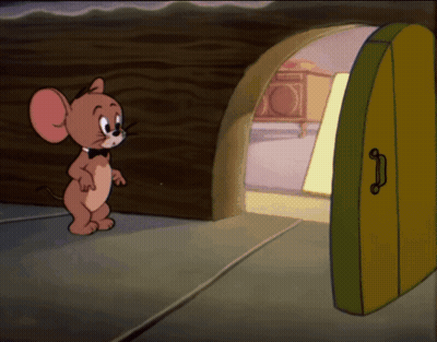A Cartoon Mouse Named Jerry Is Standing In Front Of An Open Door GIF