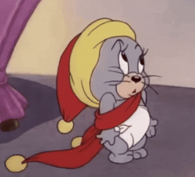 A Cartoon Mouse Wearing A Hat And Scarf Is Sitting On The Floor . GIF