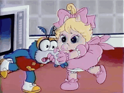 A Cartoon Of A Baby In A Pink Dress Holding A Blue Bug GIF