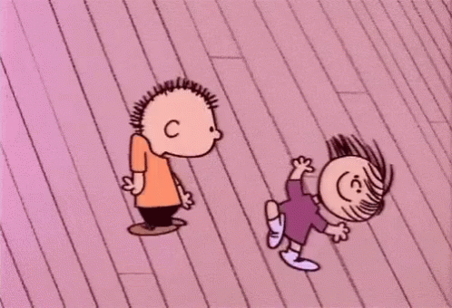 A Cartoon Of A Boy And A Girl Dancing On A Pink Floor . GIF