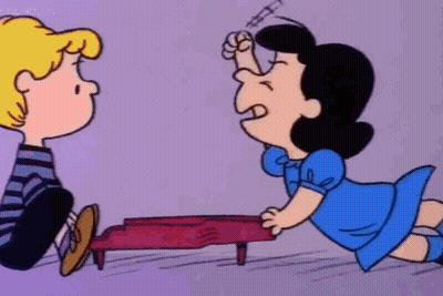 A Cartoon Of A Boy And A Girl Sitting Next To Each Other . GIF
