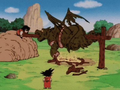 A Cartoon Of A Boy Standing In Front Of A Large Dragon GIF