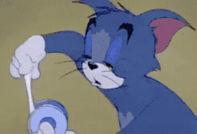 A Cartoon Of A Cat Holding A Stick With A Burst Of Light Coming Out Of It GIF