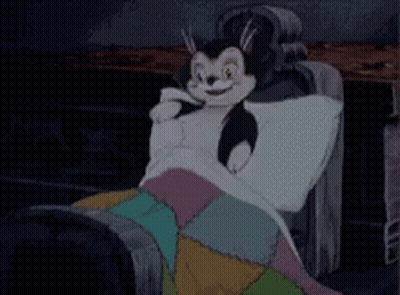 A Cartoon Of A Cat Laying On A Couch GIF