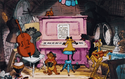 A Cartoon Of A Cat Playing A Piano With Other Cats GIF