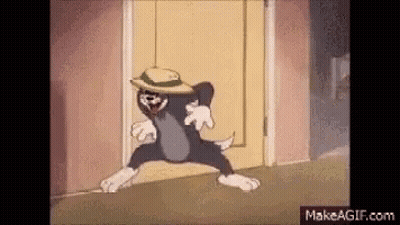A Cartoon Of A Cat Wearing A Hat Is Walking Through A Doorway . GIF
