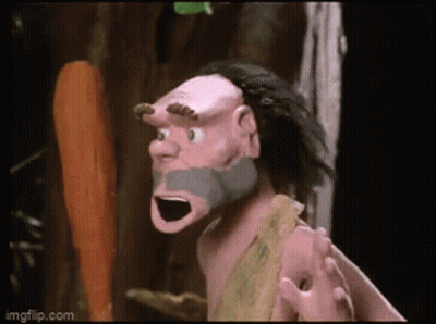 A Cartoon Of A Caveman With A Beard And Horns GIF
