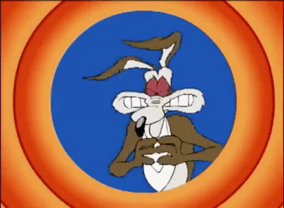 A Cartoon Of A Coyote Wearing Glasses And A Red Bow Tie GIF